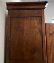A French oak and cherrywood armoire, late 18th/early 19th century
