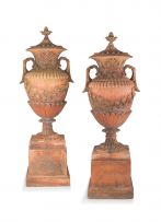 A pair of terracotta composition two-handled garden urns-on-stands and covers, mid 20th century