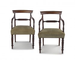 A pair of George IV mahogany library armchairs