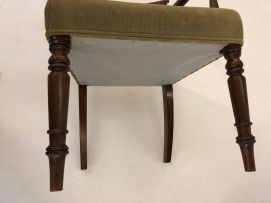 A pair of George IV mahogany library armchairs