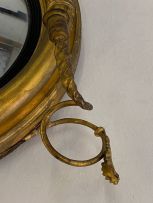 A Regency style convex giltwood mirror, 19th century