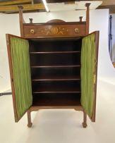 An Arts and Crafts mahogany inlaid cabinet, Maple & Co Ltd