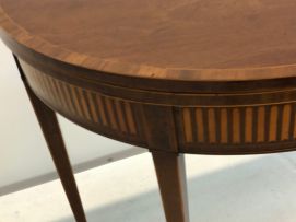 A George III mahogany and birds-eye-maple inlaid card table