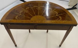An Edwardian mahogany and satinwood inlaid card table