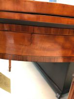 A satinwood, yew wood, rosewood and marquetry card table