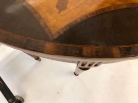 A satinwood, yew wood, rosewood and marquetry card table
