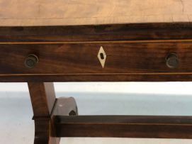 A George III mahogany and rosewood sofa table