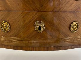 A Louis XVI style demi-lune parquetry and gilt-metal-mounted cabinet