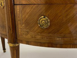 A Louis XVI style demi-lune parquetry and gilt-metal-mounted cabinet