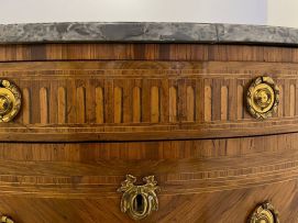 A Louis XVI style demi-lune parquetry and gilt-metal-mounted cabinet