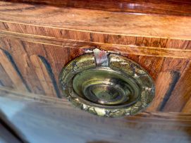 A Louis XVI style demi-lune parquetry and gilt-metal-mounted cabinet