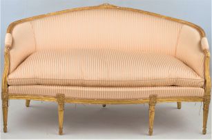 A Louis XV style giltwood and upholstered settee
