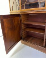 A George III style mahogany breakfront bookcase, late 19th century