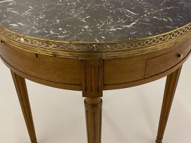 A Louis XV style gilt-metal-mounted marble-topped occasional table