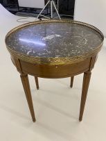 A Louis XV style gilt-metal-mounted marble-topped occasional table