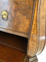 A Dutch walnut corner cupboard, 19th century