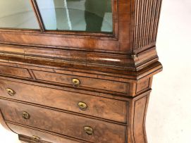 A Dutch walnut corner cupboard, 19th century