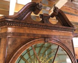 A Dutch walnut corner cupboard, 19th century