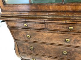 A Dutch walnut corner cupboard, 19th century