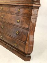 A Dutch walnut corner cupboard, 19th century