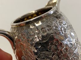 A Victorian silver cream jug, Rupert Favell, London, 1882