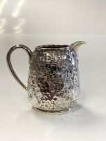 A Victorian silver cream jug, Rupert Favell, London, 1882