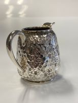 A Victorian silver cream jug, Rupert Favell, London, 1882