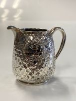 A Victorian silver cream jug, Rupert Favell, London, 1882