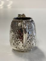A Victorian silver cream jug, Rupert Favell, London, 1882