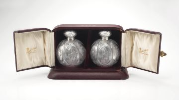 A pair of Victorian silver-mounted and cut-glass scent bottles, retailed by Flavelle Brothers Ltd, Sydney & London, Chester, 1899