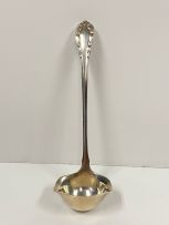 A Georg Jensen 'Lily of the Valley' pattern silver sauce ladle, 1930-1933