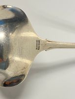 A Georg Jensen 'Lily of the Valley' pattern silver sauce ladle, 1930-1933