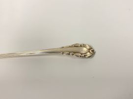 A Georg Jensen 'Lily of the Valley' pattern silver sauce ladle, 1930-1933