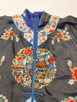 A Chinese embroidered silk tunic, early 20th century