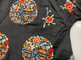 A Chinese embroidered silk tunic, early 20th century