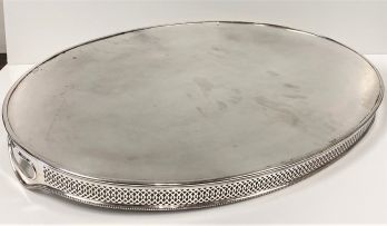A silver-plate gallery tray