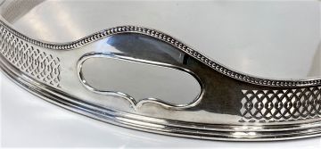 A silver-plate gallery tray