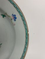 A set of nine Chinese famille-rose plates, Qing Dynasty, Qianlong period, 1736-1795