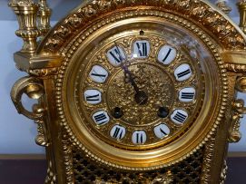 A gilt-metal and bronzed clock garniture, late 19th century