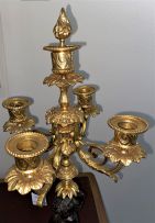 A gilt-metal and bronzed clock garniture, late 19th century