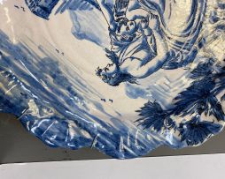 A blue and white faience dish