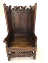 A beech and oak hall armchair, 18th century with later 19th century elements