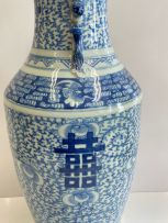A near pair of Chinese blue and white baluster vases, Qing Dynasty, 19th century