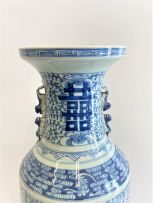 A near pair of Chinese blue and white baluster vases, Qing Dynasty, 19th century