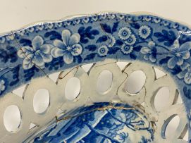 A pair of Spode 'Tower Blue' pattern blue and white reticulated oval baskets and stands, circa 1784