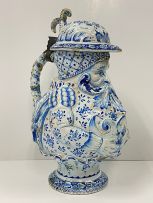 A large faience blue and white pewter mounted Toby pitcher, possible Dutch, 19th century