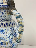 A large faience blue and white pewter mounted Toby pitcher, possible Dutch, 19th century