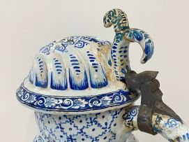 A large faience blue and white pewter mounted Toby pitcher, possible Dutch, 19th century