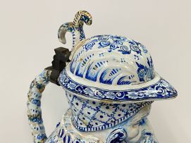 A large faience blue and white pewter mounted Toby pitcher, possible Dutch, 19th century