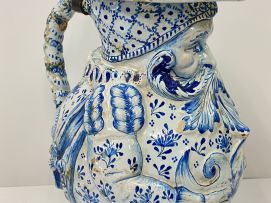 A large faience blue and white pewter mounted Toby pitcher, possible Dutch, 19th century